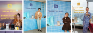 Advertisement panel with a sunset city backdrop and a woman beside a row of coffee machines slogan WHAT ELSE EVERY COFFEE A NEW WORLD