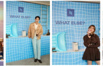 Advertisement panel with a sunset city backdrop and a woman beside a row of coffee machines slogan WHAT ELSE EVERY COFFEE A NEW WORLD