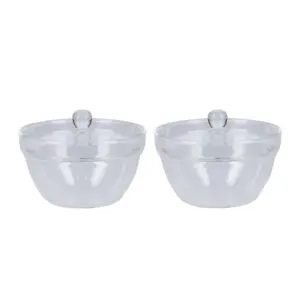 Two clear glass bowls with matching glass lids side by side kitchen storageserving bowls
