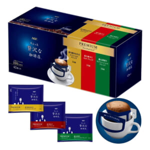 AGF Premium coffee gift set featuring a dark blue box with colorful sachets and a steaming cup image in the foreground