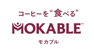865067ef02bf7f1fb39e188bbe66e802 | コーヒーステーション MOKABLE logo in maroon with Japanese slogan コーヒーを食べる above and モカブル below