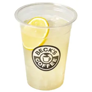 Clear plastic cup with an iced beverage and a lemon wedge branded with Becks Coffee logo