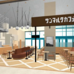 Indoor cafefood court with brown cushioned seating wooden tables and a central pillar topped by a sign with foreign characters