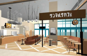 Indoor cafefood court with brown cushioned seating wooden tables and a central pillar topped by a sign with foreign characters