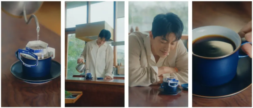 Blue coffee mug on a saucer with a pouring setup and coffee dripping into it