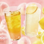 Advertisement featuring two tall glasses of iced drinks peach  jasmine tea on the left and lemonade on the right with bold Japanese text
