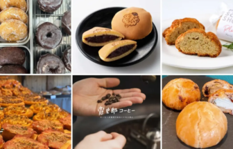 Assorted donuts and pastries in a bakery display case and on trays