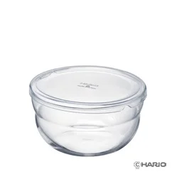 Clear glass round storage bowl with a matching transparent lid ready for food storage