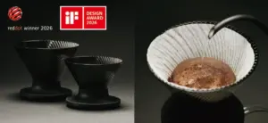 Two black ceramic pour over coffee drippers on a base left on the right hot water pouring into a white striped ceramic dripper above a pot logos show red dot winner 2026 and iF Design Award 2026