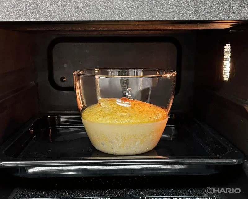 227512340b9ddc6b28260bf66702cf00d32353d800x640 | コーヒーステーション Soufflé rising in a clear glass ramekin inside a kitchen oven with a golden top