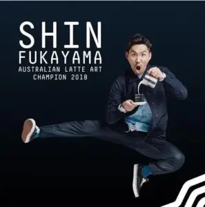 689db3d5b9cedfc0c532010ba26f532a | コーヒーステーション Promotional poster for Shin Fukayama Australian Latte Art Champion 2018 showing him mid air while pouring latte art into a cup