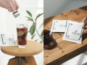 Split image left shows a hand pouring liquid into a tall glass of iced coffee right shows Herald Bonny tea sachets on a wooden table