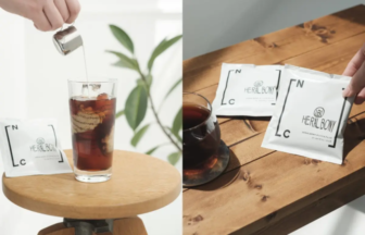 Two panel scene left shows a hand pouring sugar into a tall glass of iced coffee on a round wooden table a white packet labeled HERALD sits beside the glass Right shows a cup of tea with two white HERALDpack packets on a wooden table one being placed near the cup