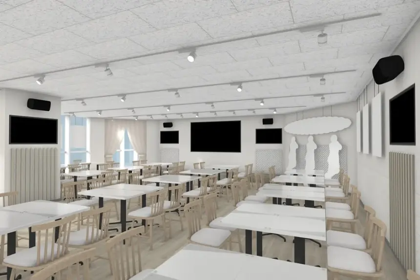 Bright modern dining hall or conference room with white tables and light wood chairs wall mounted screens and track lighting