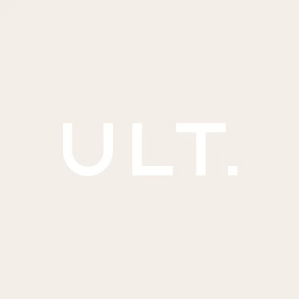 ULT in white text centered on a pale beige background minimalist logo