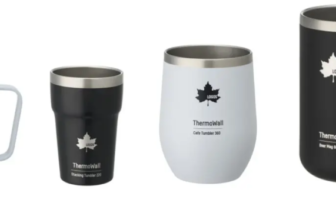 Set of four ThermoWall mugs and tumblers in white, gray, and black finishes with stainless steel rims and handles.