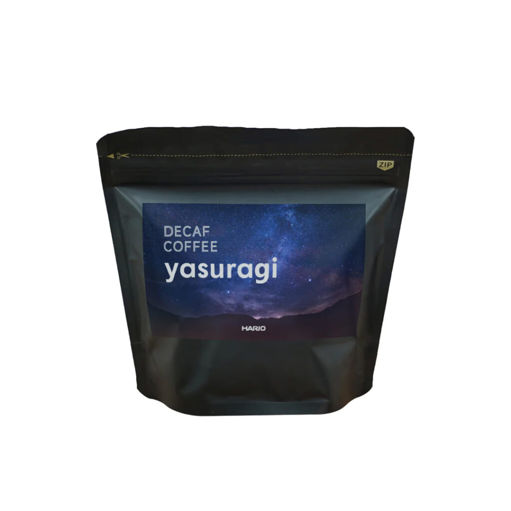 HCBD100YA | コーヒーステーション Black stand up pouch of decaf coffee labeled yasuragi with a blue starry night label HARJO brand