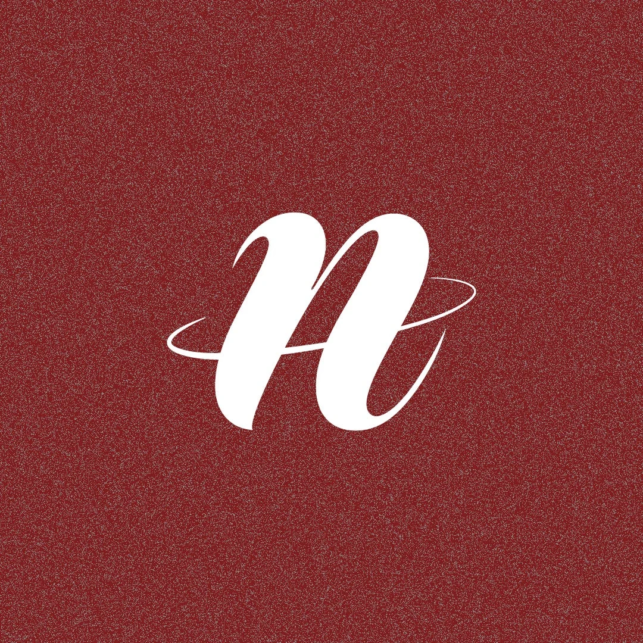 White cursive lowercase n logo with a circular swoosh on a red textured background