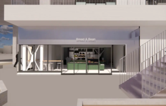 Bread & Bean café storefront with glass doors and a green-tiled counter inside.