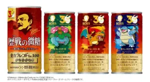 Row of four Boss Coffee cans featuring Pokémon designs Venusaur Charizard Blastoise plus a red Boss can with a portrait all labeled in Japanese