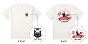 White T shirt showing a small front chest logo a black cat with glasses and Comiket 108 Caffè Veloce back features a red car with a cat driving and a cloud banner reading Comiket 108 and Caffè Veloce
