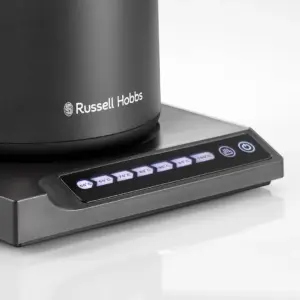 Close up of a Russell Hobbs kettle base with temperature preset buttons labeled 50°C to 105°C illuminated in blue light