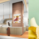 Interior of a Pierre Marcolin cafe with a curved counter and staff serving customers right side shows a banana and a whipped cream iced drink on a pastel backdrop