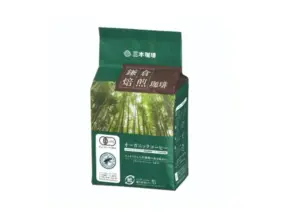 7cecf433531164386fcf7796ccb7e7a7 | コーヒーステーション Green bag of organic coffee with a forest graphic and Japanese text on the packaging conveying a natural organic product