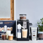 DeLonghi LatteCrema Cool upgrade set with black espresso machine milk pitcher and coffee accessories on a kitchen counter