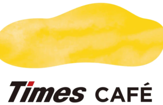 Times Café logo featuring a yellow abstract blob above the bold black text Times Café